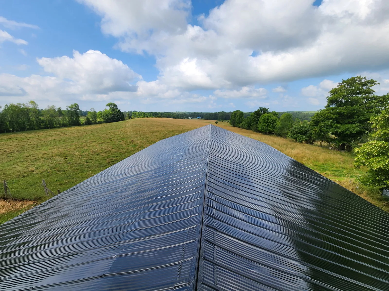 A coated grey metal roof with a clean, even finish.